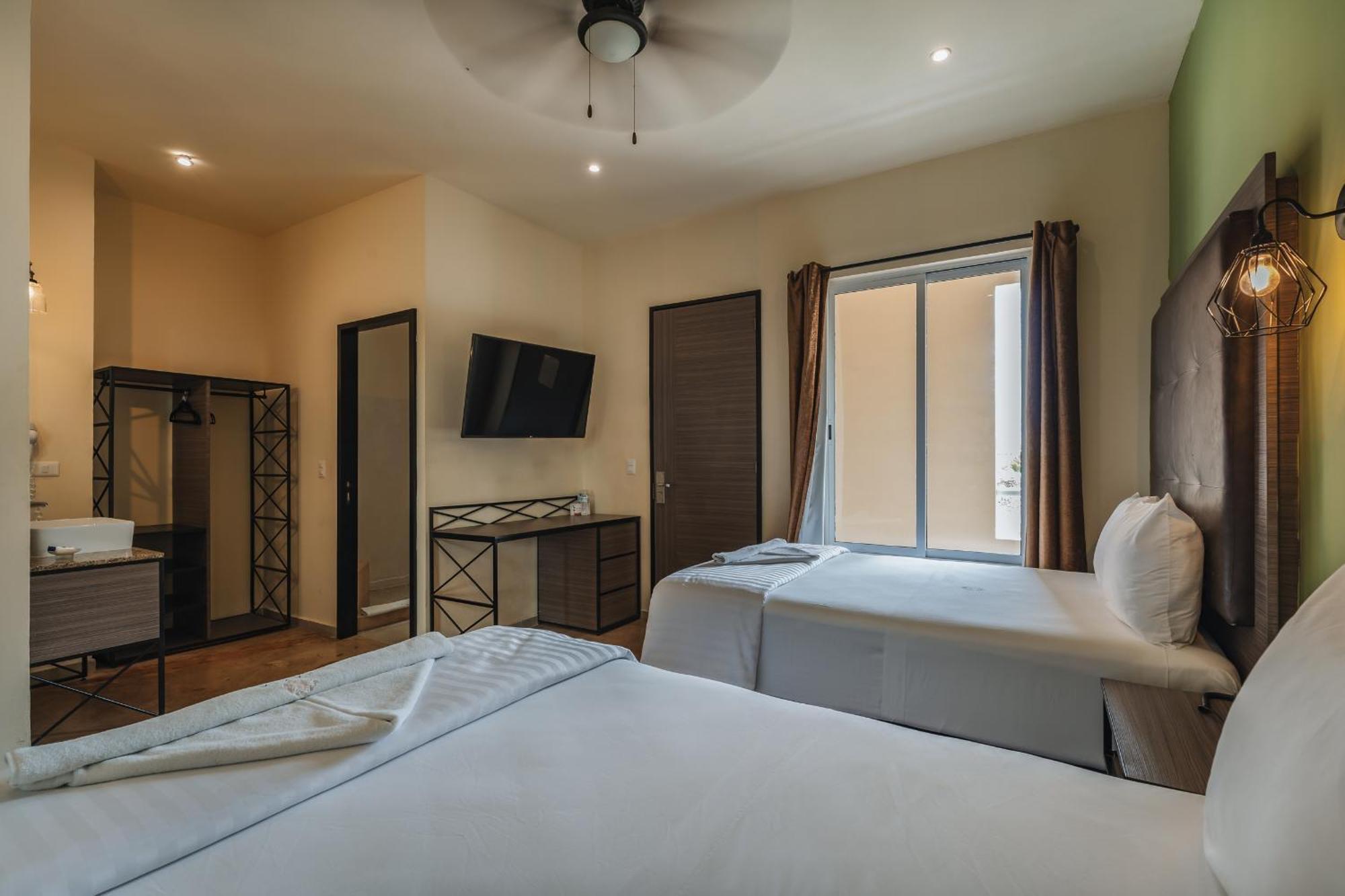 Chambre Deluxe avec 2 Lits Doubles